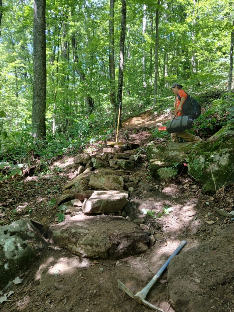 Tyler with some stone steps on the trail
